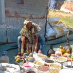 Seller with gourds at Muthi market in Durban South Africa. A top 10 tourist attraction in durban as featured on Lovedurban.co.za Durban tourist information; what's on in Durban website