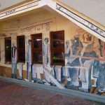 Artwork wall at the Kwa Muhle Museum in Durban South Africa as featured on the durbanvibe.co.za what's on in Durban and Durban attractions tourist information website